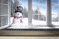 Kitchen table with christmas decorations and blurred kitchen background. Royalty Free Stock Photo