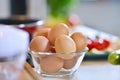 Kitchen table with eggs on basket, focus from top view kitchen table. Royalty Free Stock Photo