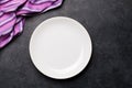 Kitchen table with plate and tablecloth Royalty Free Stock Photo