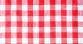 Kitchen tablecloth texture, red and white checkered background, napkin, factory textiles, linen, cotton, natural, close-up, space Royalty Free Stock Photo