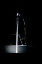 The kitchen tap water flowing glowing Royalty Free Stock Photo