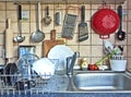 Kitchen tools hanging on the sink Royalty Free Stock Photo