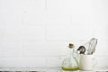 Kitchen tools on a kitchen shelf against a white brick wall. selective focus Royalty Free Stock Photo