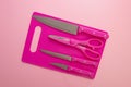 Kitchen Tools on pink kitchen board