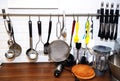 Kitchen tools on a white wall Royalty Free Stock Photo