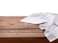 Kitchen towel on empty wooden table. Napkin close up top view mock up for design. Kitchen rustic background. Royalty Free Stock Photo