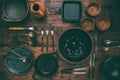 Kitchen utensils, cooking tools, on wooden background Royalty Free Stock Photo