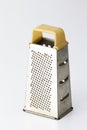 Kitchen Utensils Ideas. Old and Rusty Used Grater Made of Stainless Steel Isolated Over Pure White Background