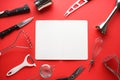Various kitchen utensils on a red background with space for text, top view Royalty Free Stock Photo