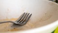 The kitchen utensils in the wash basin need to be washed. A pile of dirty dishes in the kitchen sink. Kitchen utensils need Royalty Free Stock Photo