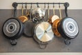 Kitchen wall rack for hanging pots, pans, aprons, and other utensils for storage and decor Royalty Free Stock Photo