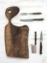 Kitchen-ware set. Old rustic chopping board made Royalty Free Stock Photo