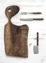 Kitchen-ware set. Old rustic chopping board made Royalty Free Stock Photo