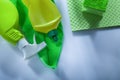Kitchen washcloth bottles sprayer sponge on white background Royalty Free Stock Photo
