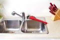 Kitchen Water tap and sink. Royalty Free Stock Photo