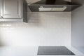 Kitchen with white brick tiles