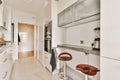 a kitchen with white cabinetry and a counter top Royalty Free Stock Photo