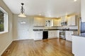 Kitchen with white cabinets and granite tops