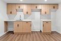 Kitchen with white cabinets and a sink Royalty Free Stock Photo