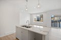 Kitchen with a white countertop and two sinks Royalty Free Stock Photo
