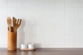 Kitchen with white tiles on the wall. Kitchen tools. Royalty Free Stock Photo