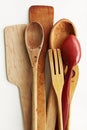 Kitchen wooden utensils on a white background Royalty Free Stock Photo