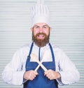 Kitchenware and cooking concept. Lets try taste. Add some spices. Man with beard in cook hat and apron hold cooking Royalty Free Stock Photo