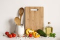 Kitchenware, vegetables and spices on table wall background. Recipe Template mockup