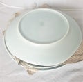Kitchenware whiteware tableware ceramic porcelain plates bowls saucer cups jugs mugs Royalty Free Stock Photo