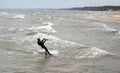 kite boarder and surfer in cold water