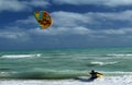 Kite Boarder Surfs Beach