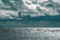 Kite boarding. Kite surfer freestyle at sunset. Royalty Free Stock Photo