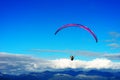 Kite flyer in the sky background