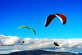 Kite flyers in the sky background Royalty Free Stock Photo