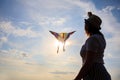 Kite in hand against the blue sky in summer, flying kite launching, fun summer vacation, freedom Royalty Free Stock Photo