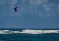 Kite surfer approaches large wave in Dominica Republic