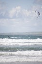 Kite surfer on big waves