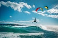 A kite surfer catching a gust of wind Royalty Free Stock Photo