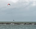 Kite surfer jumps the Motueka Sandspit swamped by a spring high tide