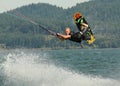 Kite surfer performs back scratch Royalty Free Stock Photo