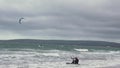 Kite surfer practising acrobatics in a Northern open ocean bay