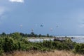 A kite surfer rides on the sea. Kites in the sky. Royalty Free Stock Photo