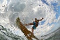 Kite surfer jumps with kiteboard Royalty Free Stock Photo