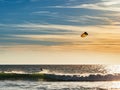 Kite surfer surfing at sunset at Tarifa beach Royalty Free Stock Photo