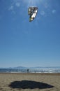 Kite surfer walking on the beach