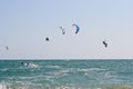 Kite surfers on a choppy sea Royalty Free Stock Photo