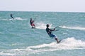 Kite surfers on a choppy sea Royalty Free Stock Photo