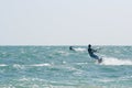 Kite surfers on a choppy sea Royalty Free Stock Photo