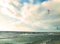 kite surfers rushing over stormy sea Royalty Free Stock Photo