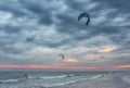 Kite surfers at sunset Royalty Free Stock Photo